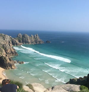 Pedn Voun der beach Porthcurno west cornwall with Logans Rock as a backdrop,out and about holiday rental in Cornwall, St Ives, Carbis Bay.